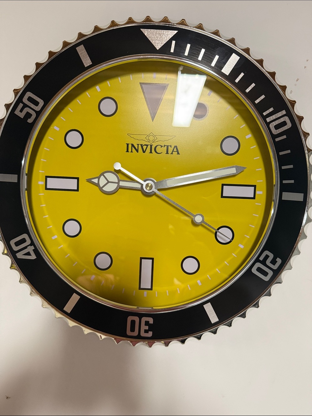 # 131 Invicta Pro Diver Yellow Dial Wall Clock with Black Bezel